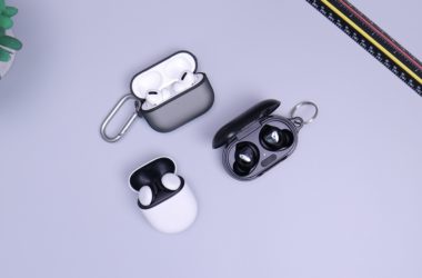 black and white headphones on white table